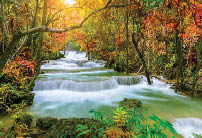 Colorful majestic waterfall in national park forest during autumn - Image